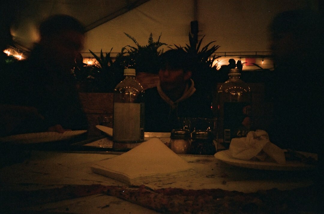 Team reviewing reports around a table in the evening