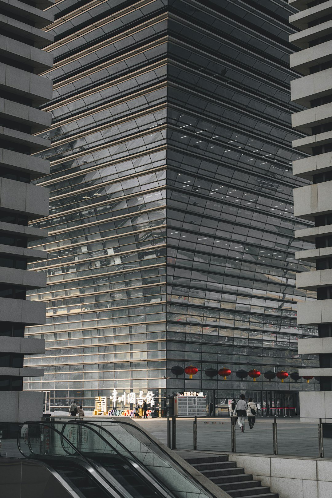 Modern office interior with people walking and talking